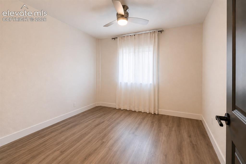 Image 14 of 46: ADU Bedroom with LVP