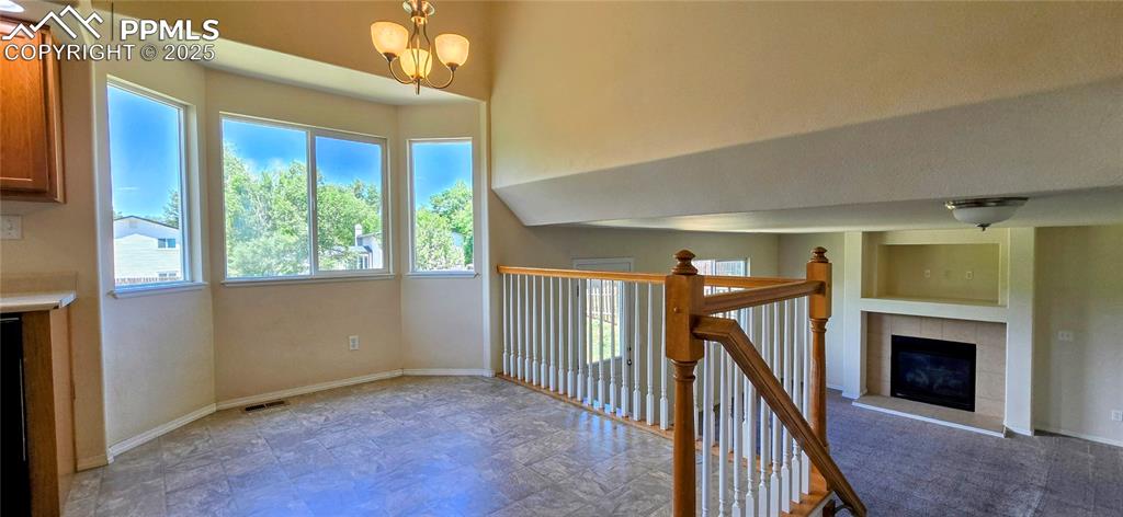 Image 4 of 24: Breakfast nook overlooking living room, bay window. 