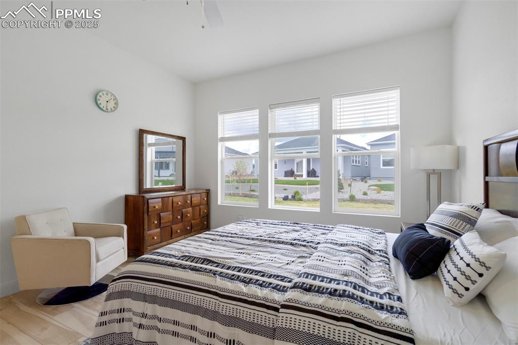 Image 27 of 45: Bedroom featuring ceiling fan