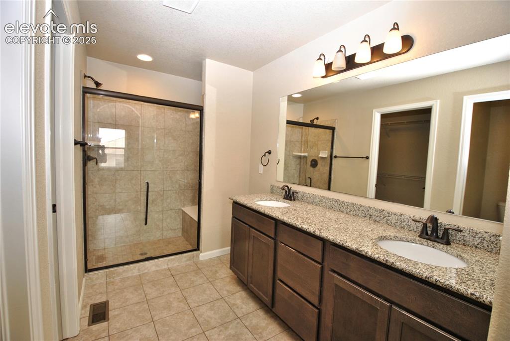 Image 13 of 31: Master Bathroom