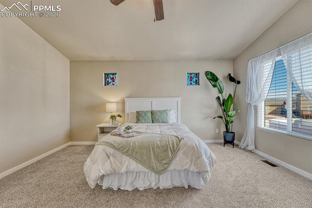 Image 22 of 50: Master Bedroom