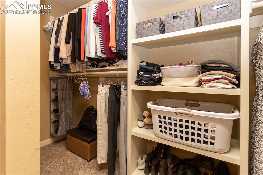Image 19 of 43: Master Walk-in Closet