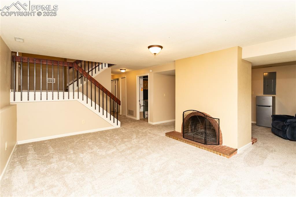 Image 24 of 43: Lower level Family Room