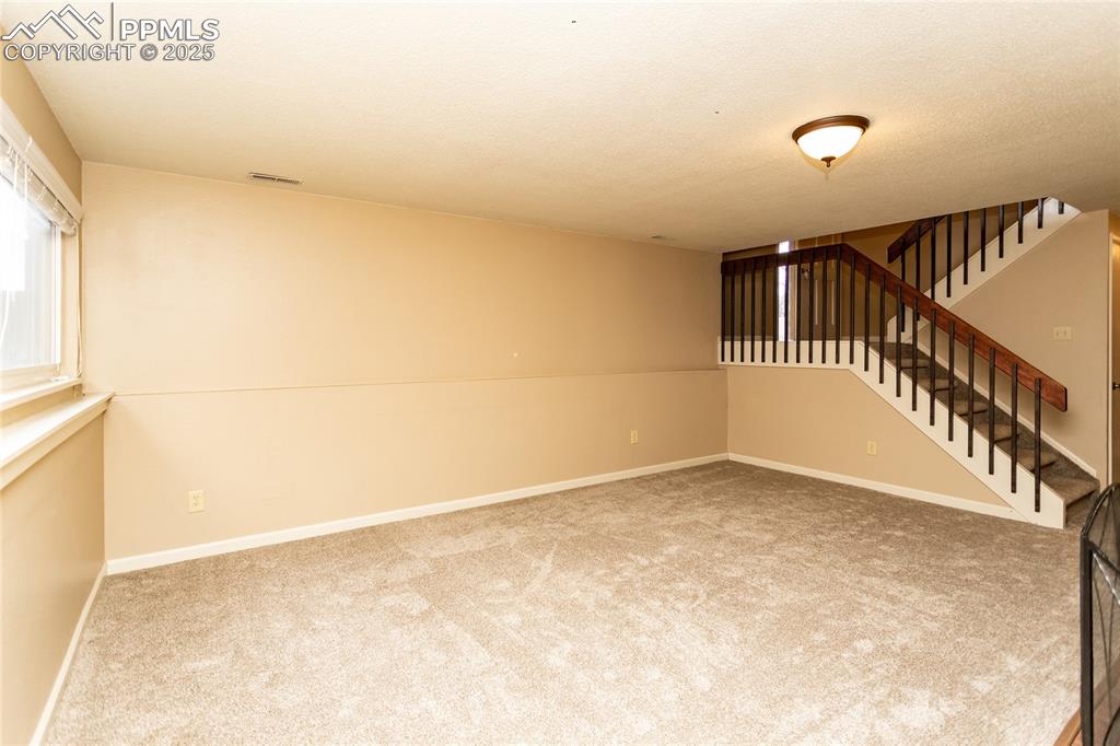Image 25 of 43: Lower level Family Room
