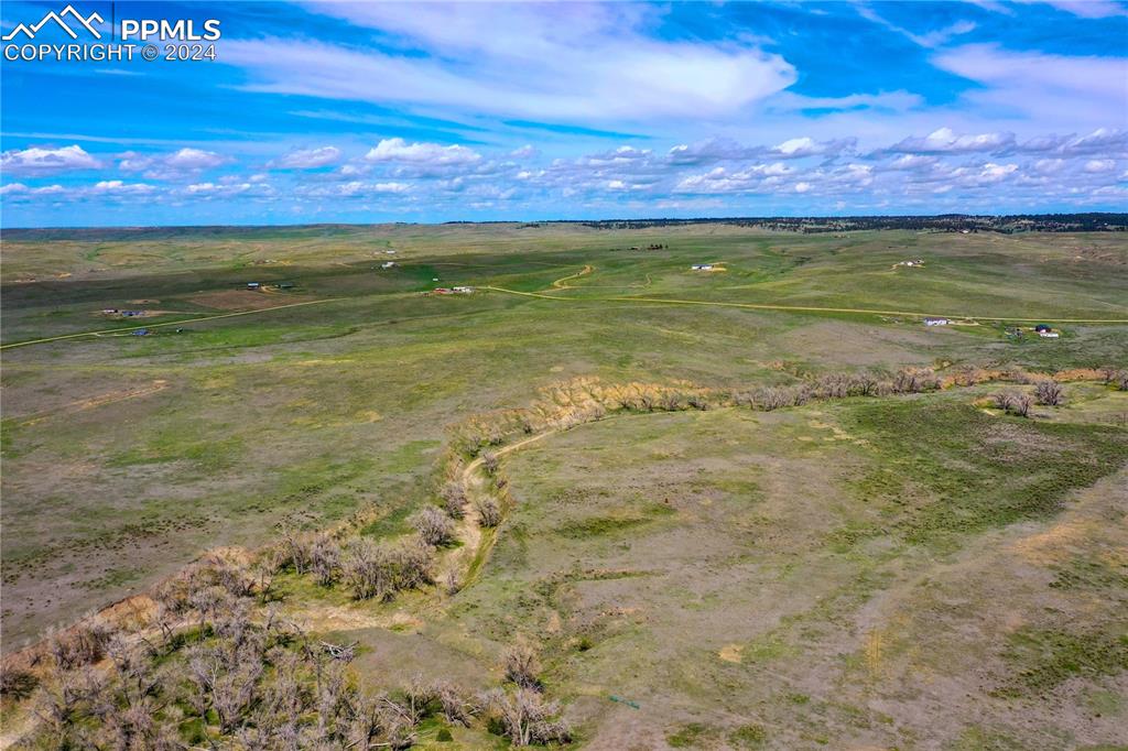 Image 5 of 6: Birds eye view of property featuring a rural view