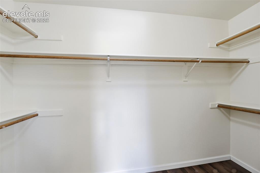 Image 22 of 32: Walk in Closet in Primary