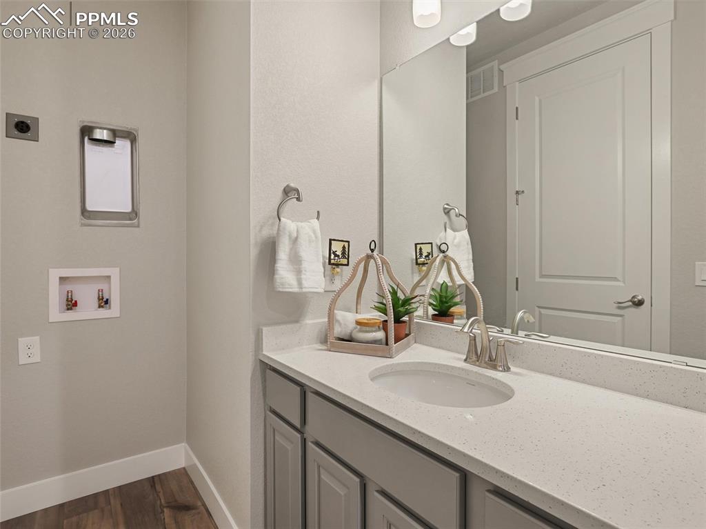 Image 22 of 47: Fullbath with 2nd laundry space