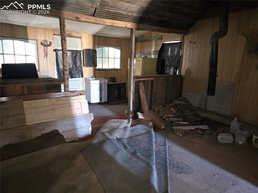 Image 7 of 16: Dining/Potential Wood Stove Area