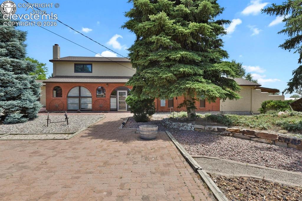 Image 6 of 10: House Front