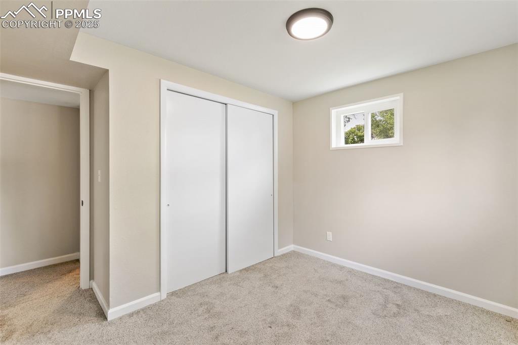 Image 22 of 50: New interior paint and new carpet in the basement. 