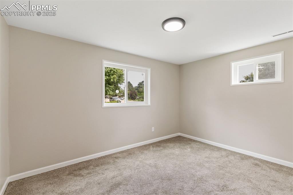 Image 23 of 50: New interior paint and new carpet in the basement. 