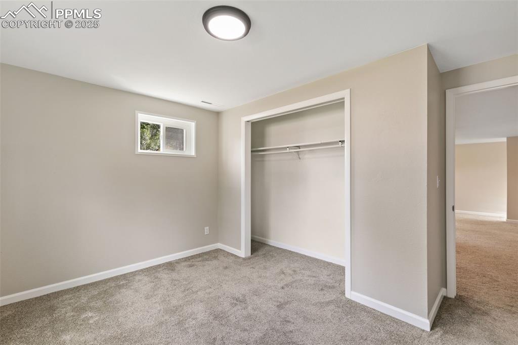 Image 24 of 50: New interior paint and new carpet in the basement. 