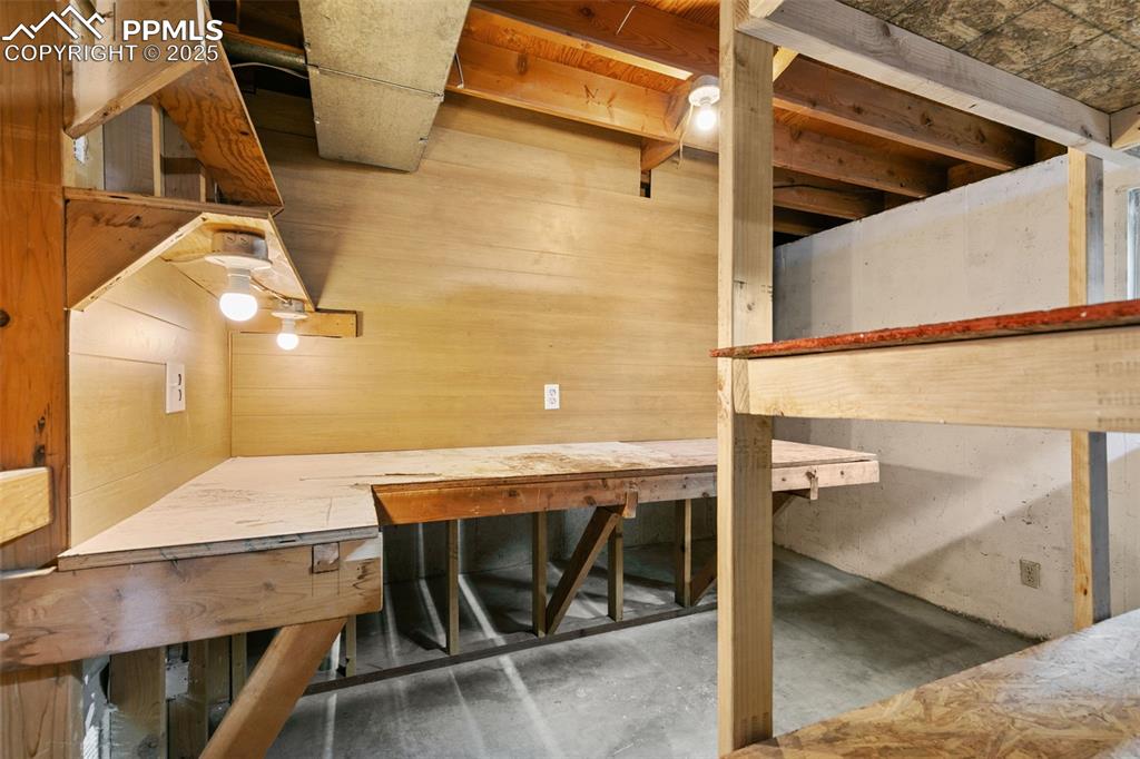 Image 25 of 50: Work bench in the utility room in the basement. 