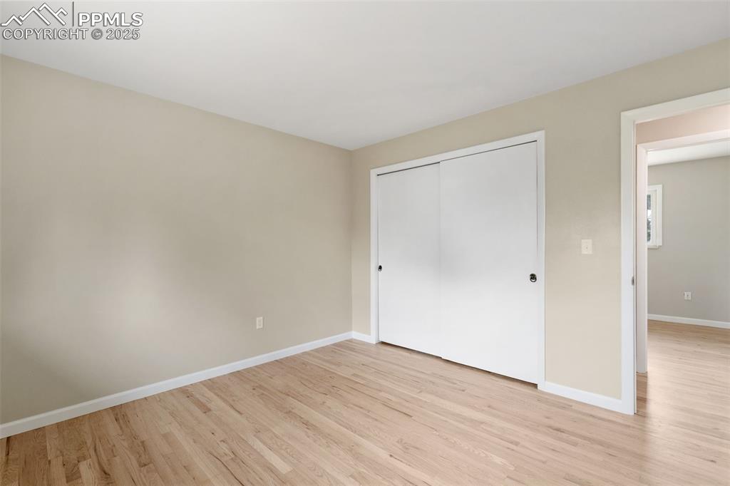 Image 39 of 50: New interior paint and refinished 2" oak flooring on main level.
