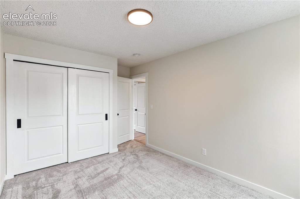 Image 15 of 28: Bedroom