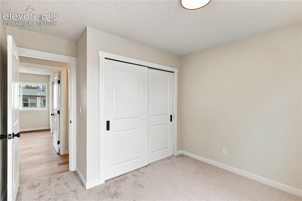 Image 18 of 28: Bedroom