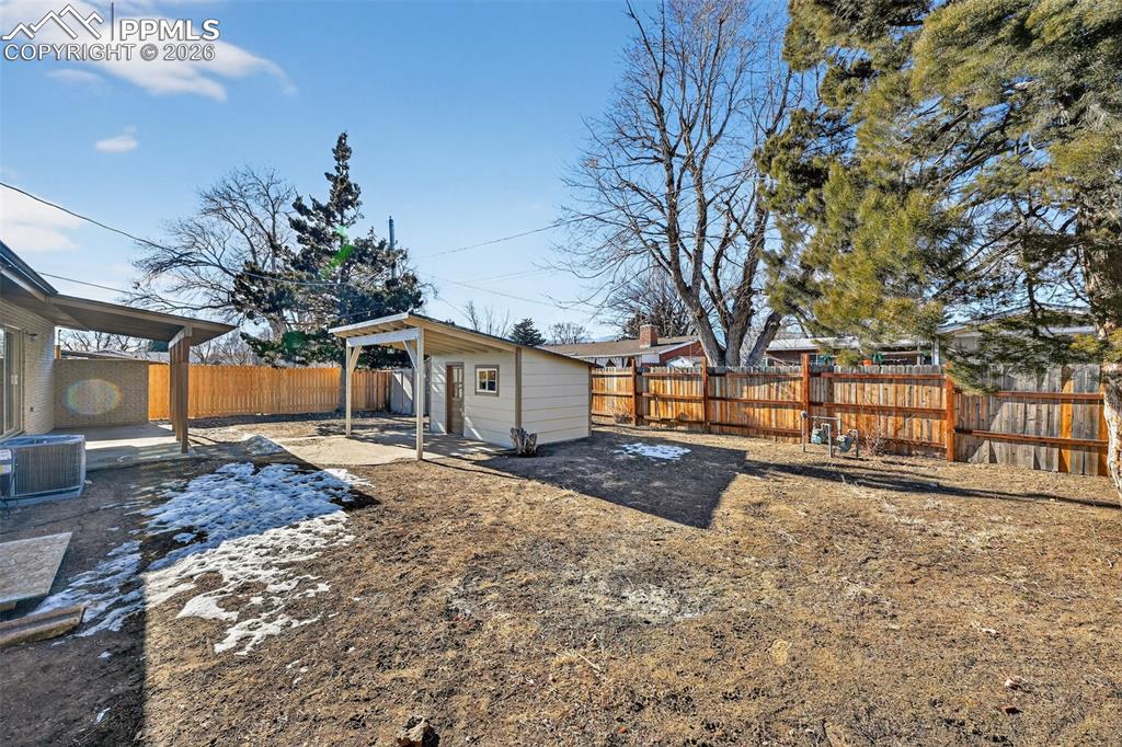 Image 32 of 35: Backyard with storage shed