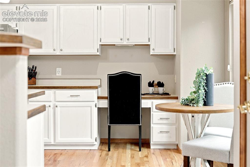 Image 10 of 27: Built In Desk In Kitchen