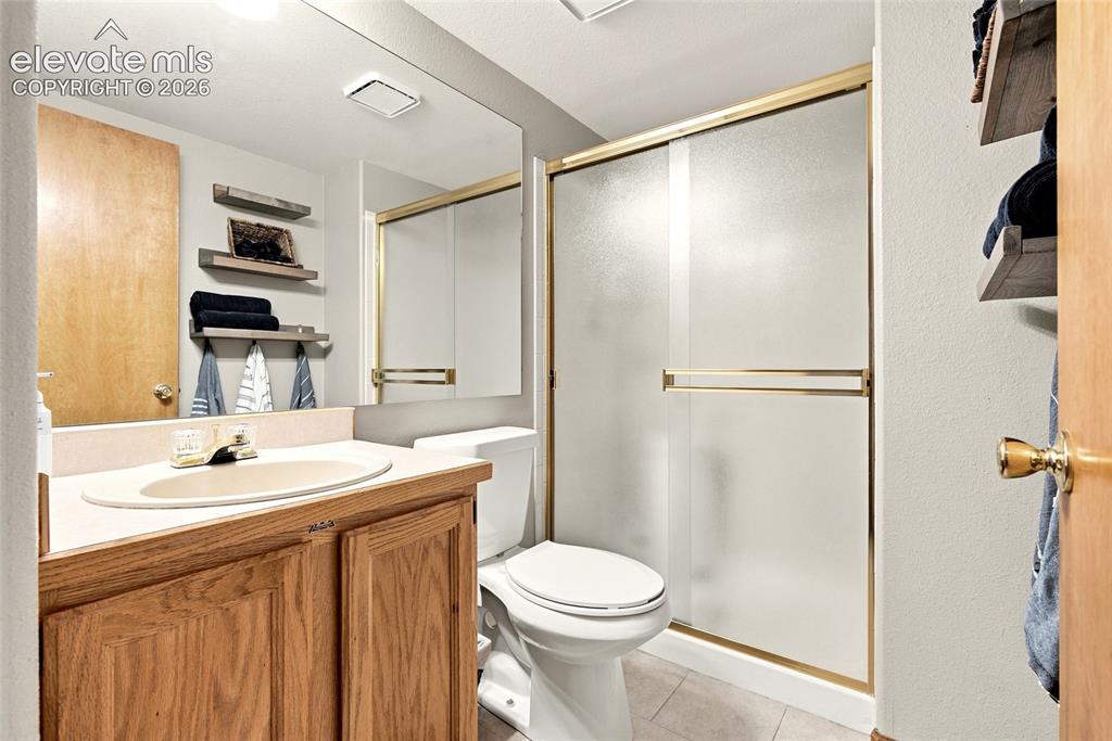 Image 26 of 27: 3/4 Bath on Main Level Off Of Bedroom