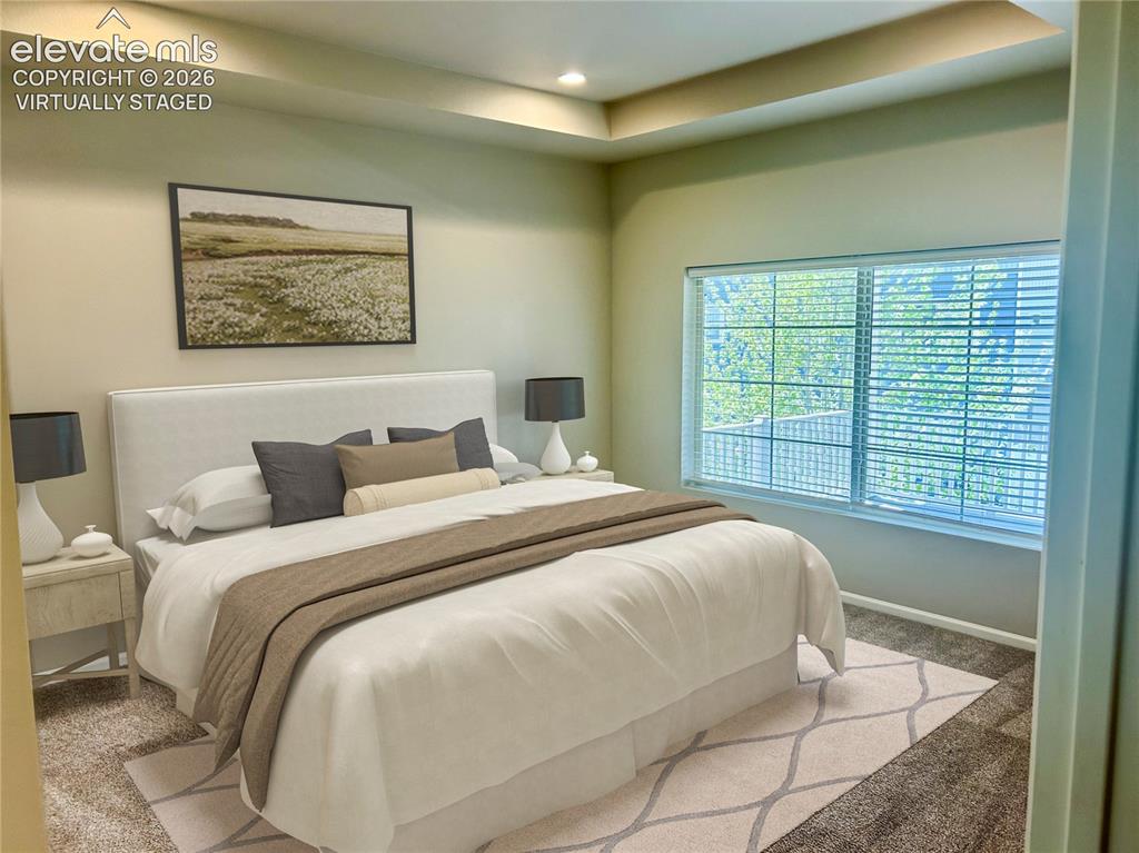 Image 15 of 38: Primary bedroom virtually staged