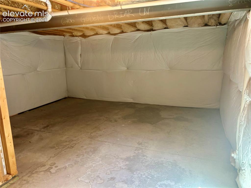 Image 34 of 38: unfinished basement space 