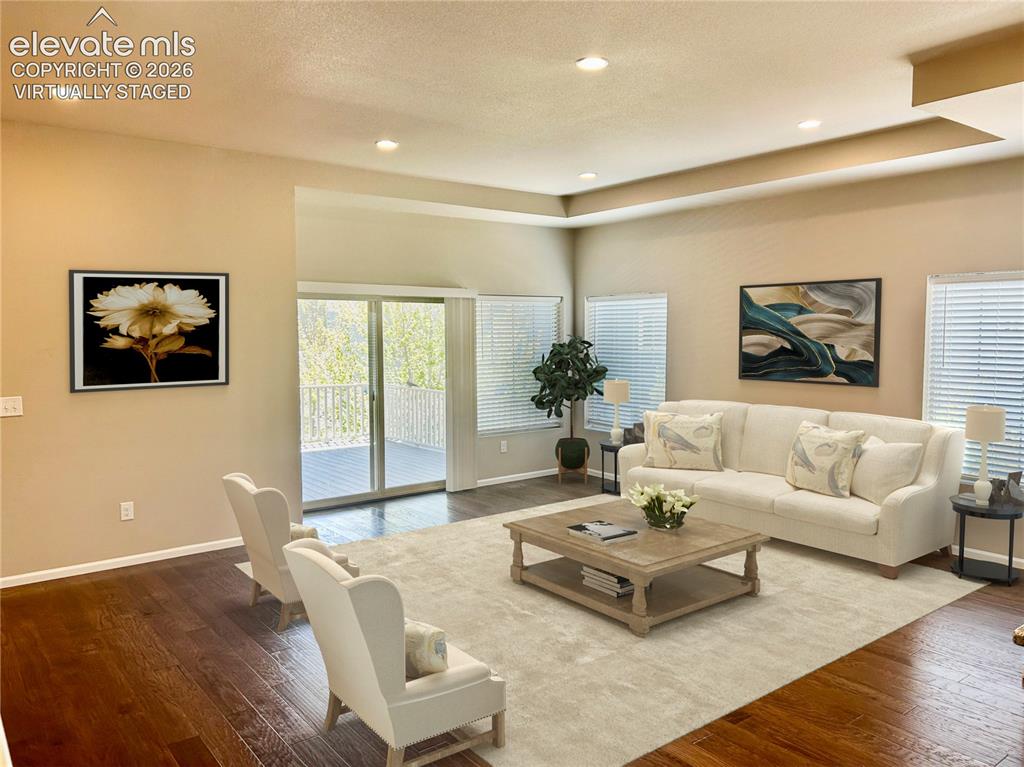 Image 9 of 38: Virtually Staged main level living space