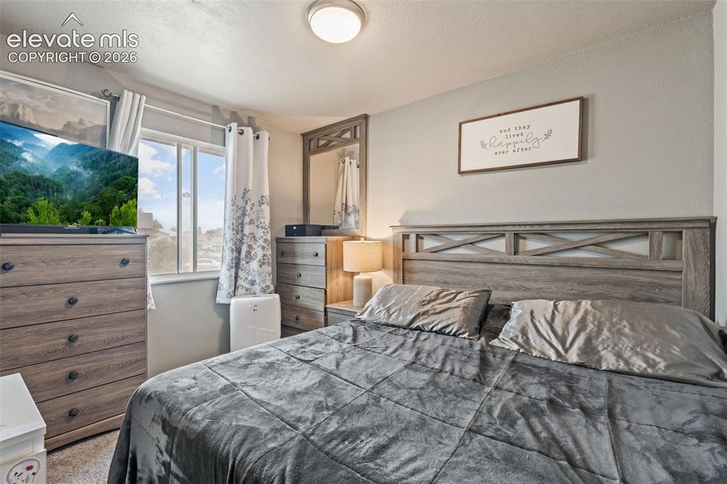 Image 22 of 48: Bedroom