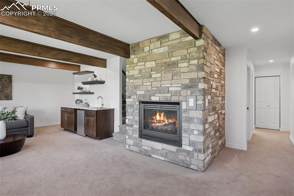 Image 20 of 49: Walkout with gas fireplace 