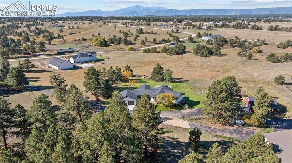 Image 45 of 49: View of property location featuring rural landscape and mountains
