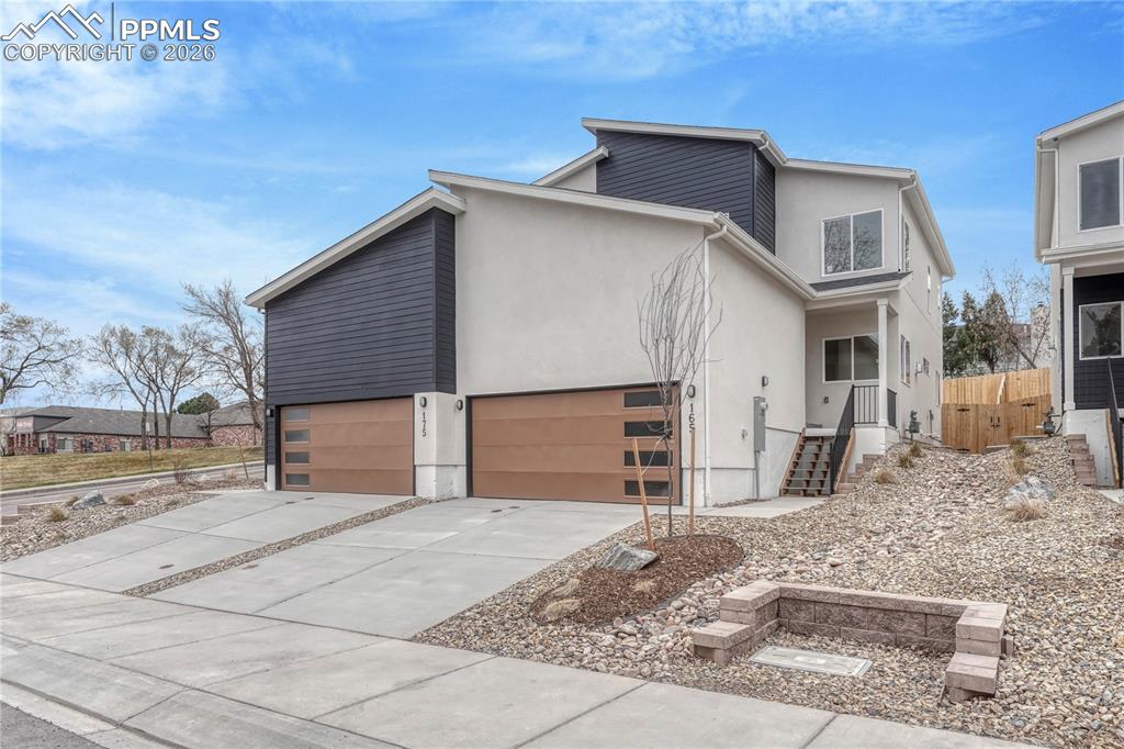 Image 1 of 47: New construction located in Southwest Colorado Springs’ new Creekwalk neigh