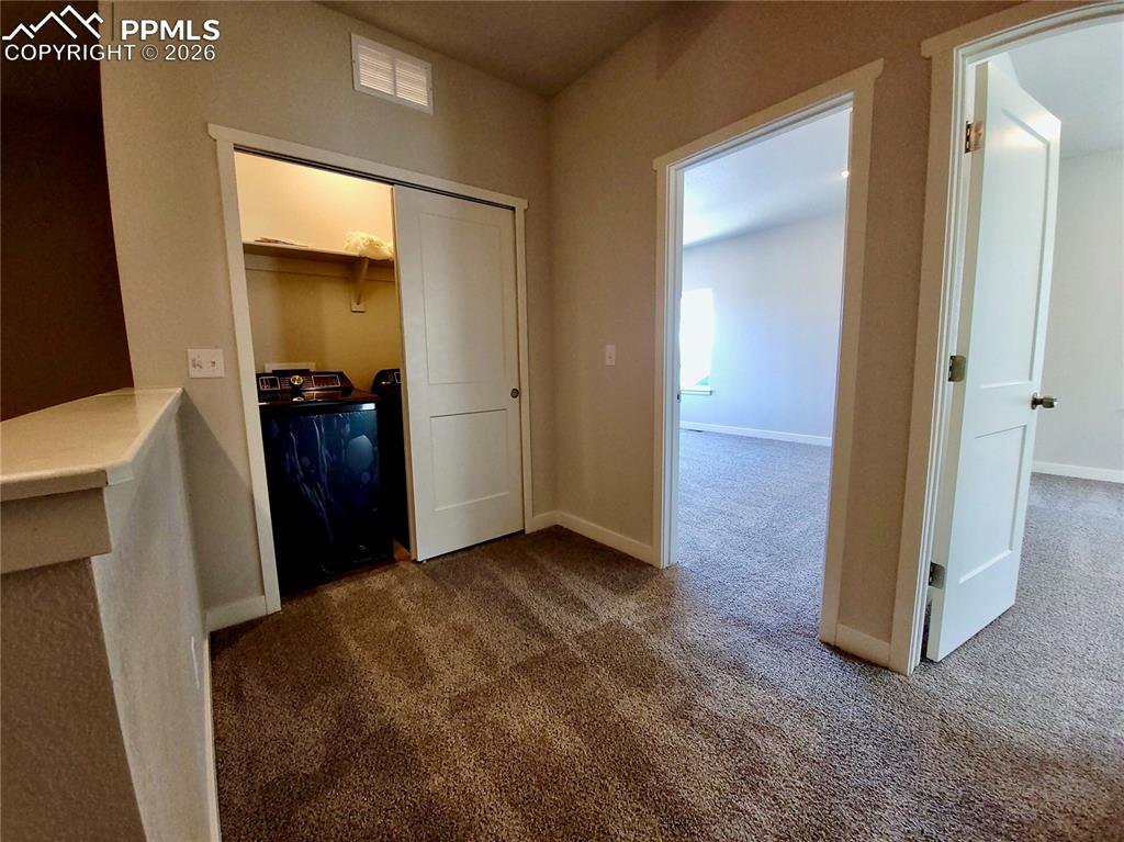 Image 13 of 47: Laundry is conveniently upstairs (example finishes)