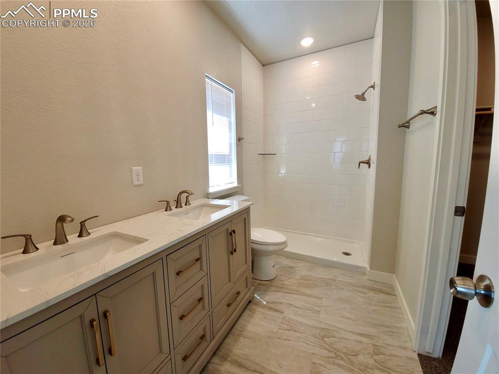 Image 27 of 47: Private ensuite bathroom and walk-in closet (example finishes)