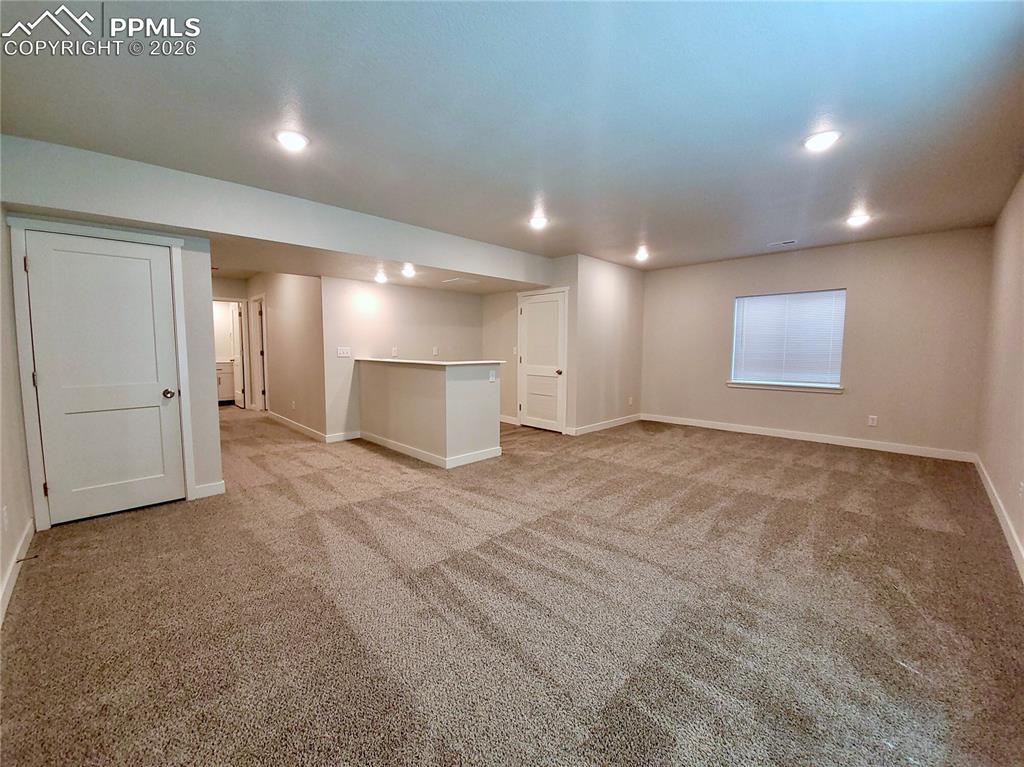 Image 31 of 47: Perfect space for games, hobbies, media, gym, or anything your heart desire