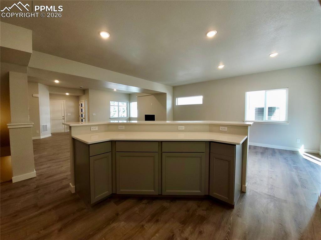 Image 9 of 47: Extra cabinet and counter space, plus outlets for mini appliances or charge
