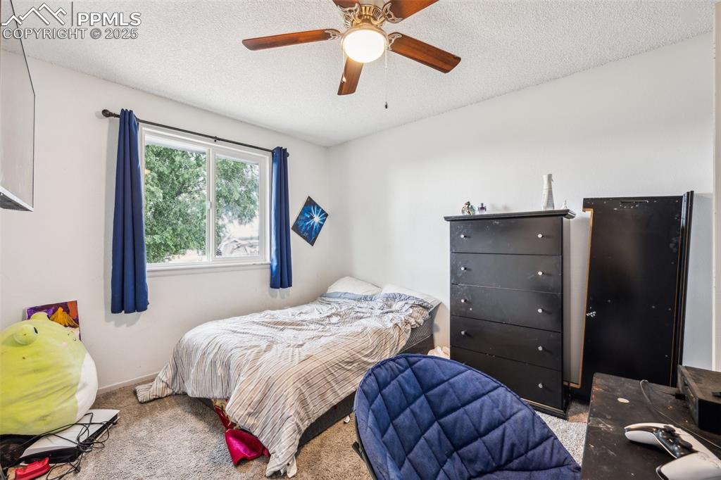 Image 16 of 19: Bedroom 3 on the upper level