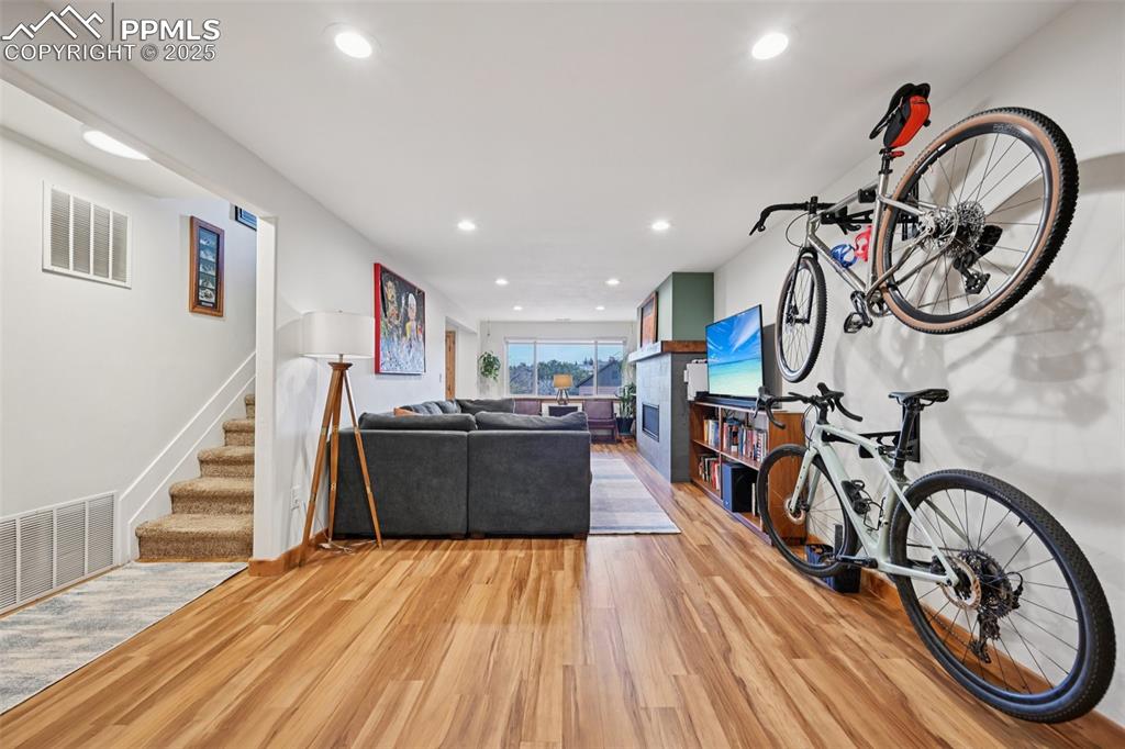 Image 30 of 42: Family room with gas burning fireplace