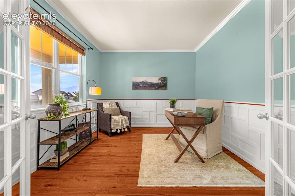 Image 2 of 44: Front office with French Doors