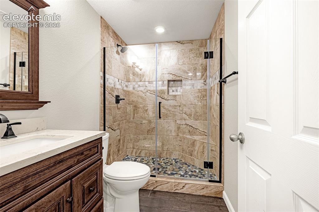 Image 38 of 44: Basement level bath