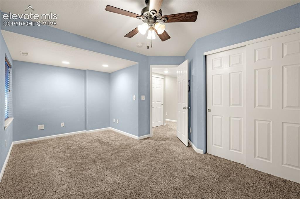Image 39 of 44: Basement level bedroom