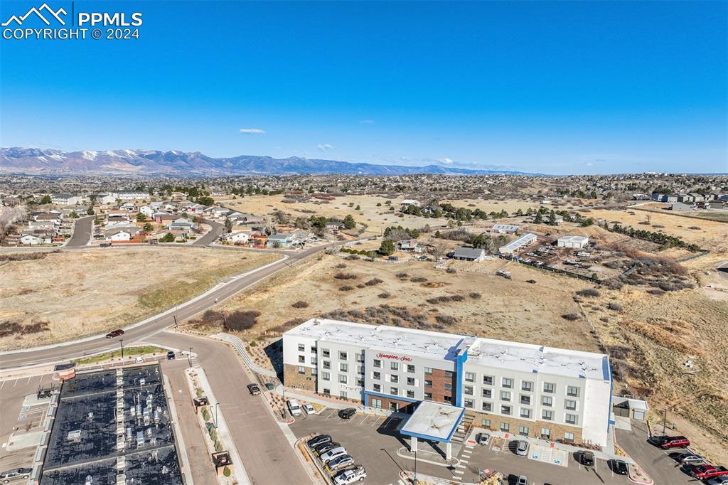 Image 21 of 25: Aerial view with a mountain view