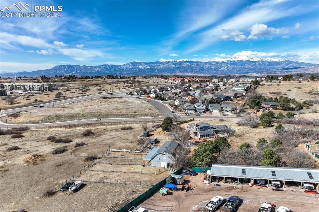 Image 5 of 25: Birds eye view of property featuring a mountain view