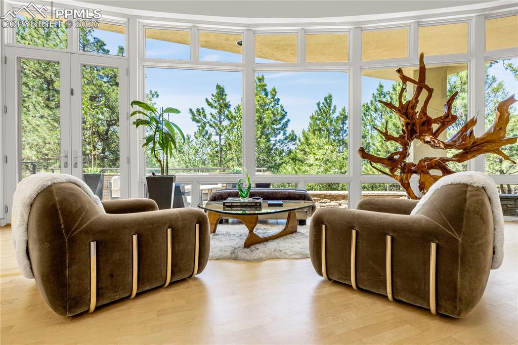 Image 10 of 48: Dining/Sitting area that with walk-out to patio