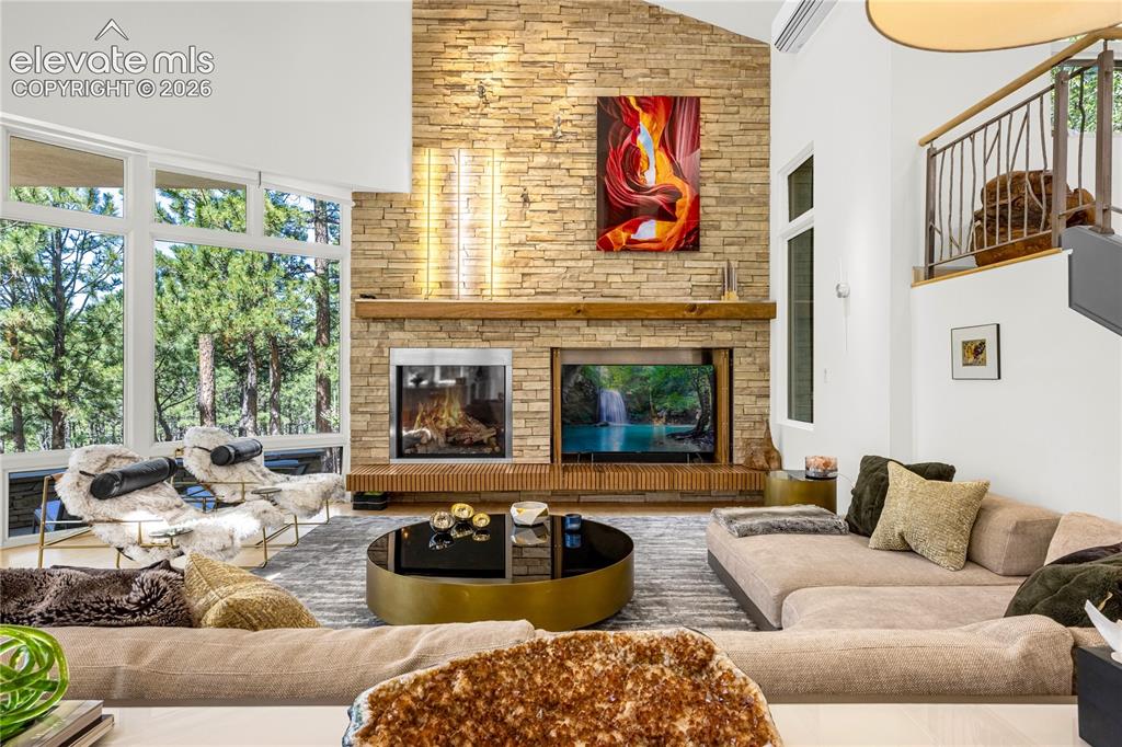 Image 10 of 49: Hand stacked natural stone fireplace