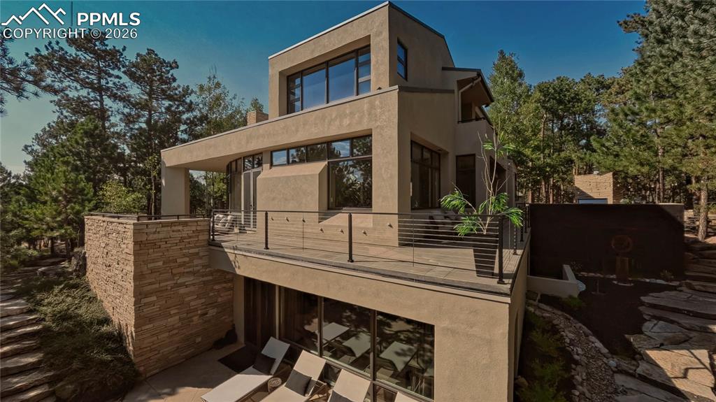 Image 3 of 48: Multiple outdoor entertainment spaces