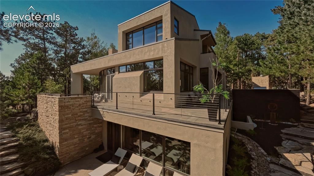 Image 4 of 49: Multiple outdoor entertainment spaces