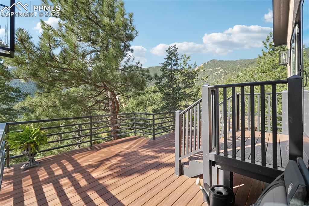 Image 25 of 50: Views off the private deck off primary bedroom