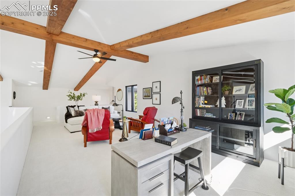 Image 30 of 50: Loft with beamed ceilings, perfect for an office