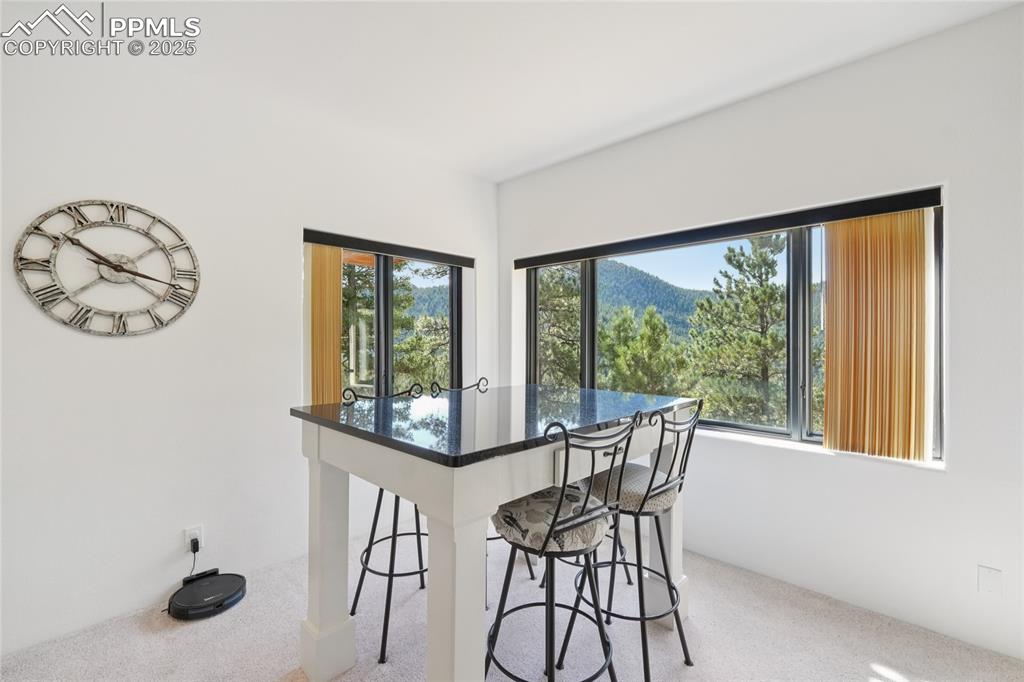 Image 33 of 50: Sitting area off lower recreation room