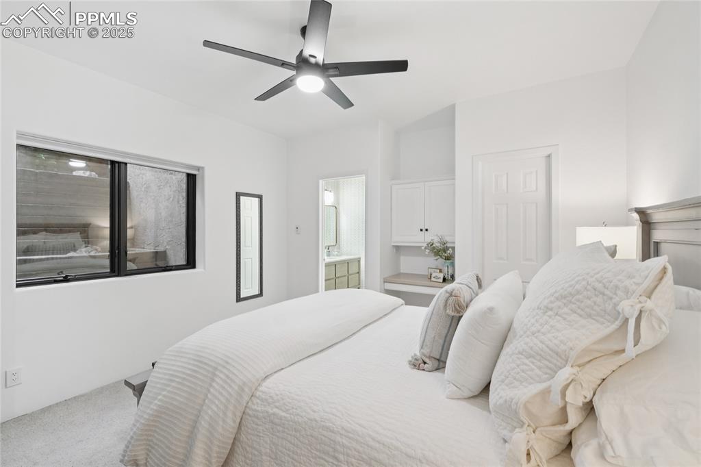 Image 38 of 50: Bedroom 2 with en suite full bathroom