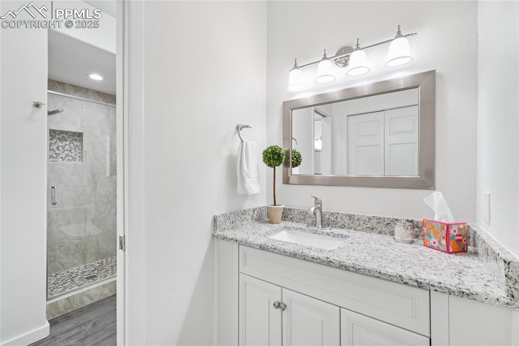 Image 41 of 50: Jack and Jill bathroom off bedroom 3 and 4